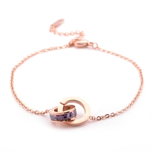 Cavigliera in acciaio inox oro rosa 18K con doppi anelli intrecciati e pietra viola