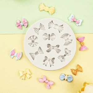 Round silicone fondant mold with 9 bow designs for DIY cake baking and chocolate making