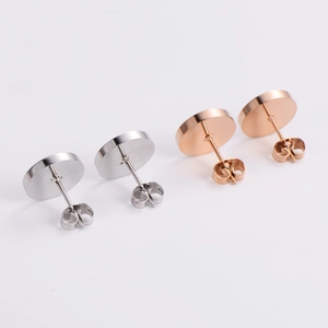 Roman numeral round stud earrings in silver and rose gold stainless steel, set of two pairs