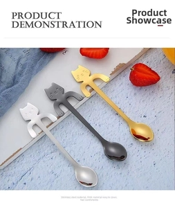 Detail of creative 304 stainless steel cat spoons in gold, silver, and black hanging on a cup