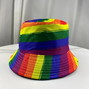 Close-up of vibrant rainbow striped reversible bucket hat with high-quality fabric texture