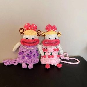 Handmade crochet sausage mouth dolls crossbody bags in purple grape and pink cherry designs
