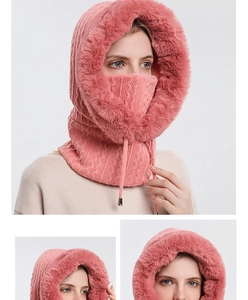 Detail of dusty pink winter hood with faux fur trim, knit texture and adjustable drawstring