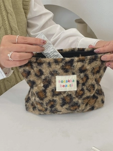 Leopard print plush makeup bag with large capacity for travel and daily essentials