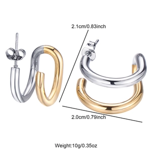 Macro detail of U-shaped gold and silver stainless steel earrings with size specifications