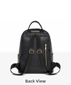 Back view of black leather commuter backpack with patchwork and anti-theft zipper pocket