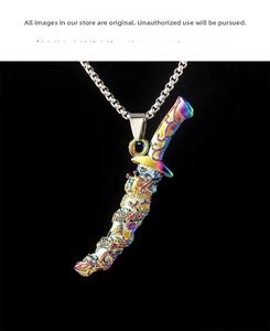 Detail of colorful dragon saber pendant with intricate scales and rainbow metallic finish