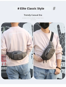 Detail view of waterproof grey waist bag with adjustable straps and front zip pocket