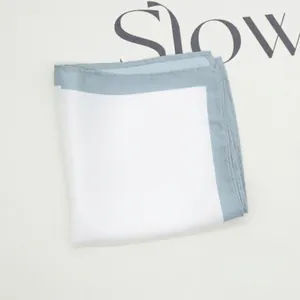 Detailed view of white and light blue grey pocket square with lace edge 22x22cm