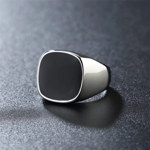 Polished stainless steel signet ring for men featuring a black square enamel inlay