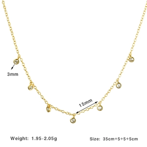 Detail view of 925 silver gold necklace featuring round cubic zirconia charms and sizing