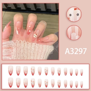 Pink gradient press-on nails with cute hand-painted bunny and white heart patterns