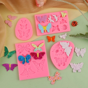 Detailed pink silicone mold for butterfly, dragonfly and ladybug fondant decorations