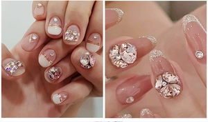 Macro detail of luxury manicure styles featuring 3D rhinestones, pearls and glitter tips
