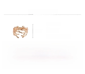 Detail view of gold geometric irregular coral-like bracelet showing its size and 6g weight