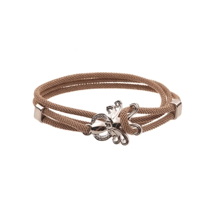 Detail of a brown braided cord bracelet featuring a silver octopus-shaped metal clasp