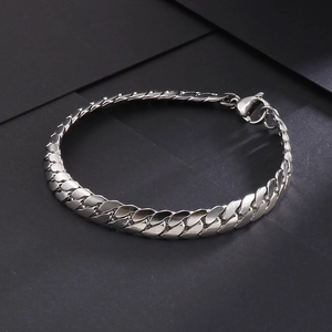 Detailed view of the silver stainless steel Cuban chain bracelet with a lobster clasp