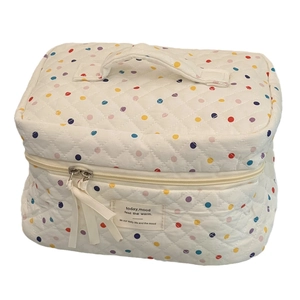Quilted cotton colorful polka dot makeup bag with top handle and zipper closure