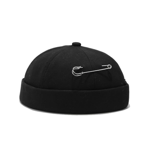Unisex black cotton miki hat with silver metal pin detail in streetwear style