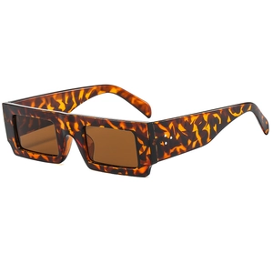 Retro square tortoiseshell sunglasses with dark brown lenses and silver rivet accents