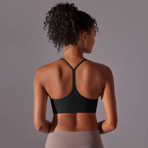 Detail of Y-back sports bra featuring breathable cut-outs and soft brushed fabric