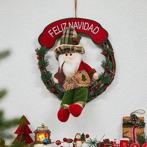 Christmas wreath with Santa Claus doll and Feliz Navidad banner on rattan ring