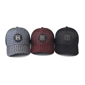 Three embroidered baseball caps with H pattern in blue, red, and black mesh designs