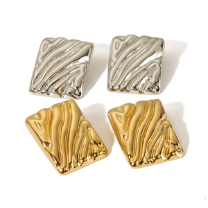 Square wavy texture stud earrings in gold and silver finish on a clean white background