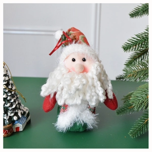 Detail of Santa plush with red knit hat and white wool beard for Christmas decor