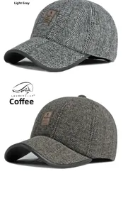 Detailed macro of herringbone fabric texture and leather brim on men's winter caps