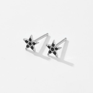 Detail view of S925 sterling silver star stud earrings with pave set black stones