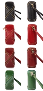 Multi-color vegetable tanned leather key pouches with durable zippers and brass hooks