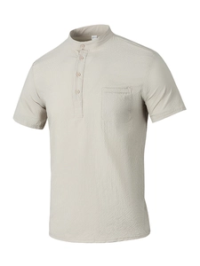 Detail of khaki waffle texture fabric on men's short sleeve Henley shirt with chest pocket