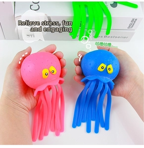 Close-up of flexible pink and blue squeeze octopus toys held by hands for sensory fun