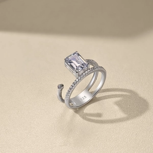 Detail of S925 sterling silver ring featuring a large emerald cut cubic zirconia stone
