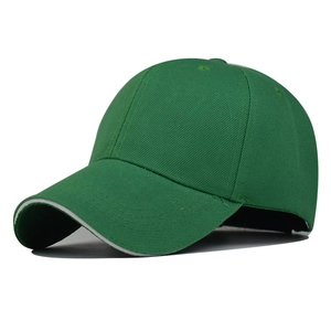 Detail of a dark green sandwich brim baseball cap with a white stripe on the peak