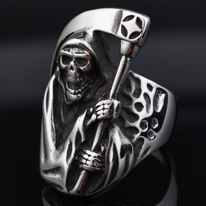 Detailed close-up of vintage stainless steel Grim Reaper skull ring with reaper scythe