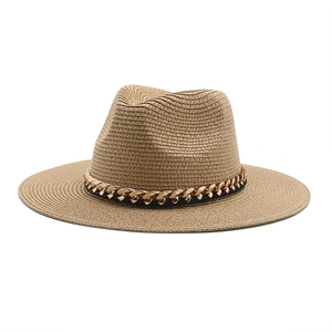 Handmade straw Panama hat for men featuring a stylish gold chain decoration on wide brim