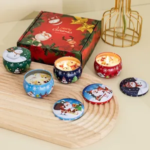 Christmas scented soy candle set with dried flowers in colorful festive tins and gift box