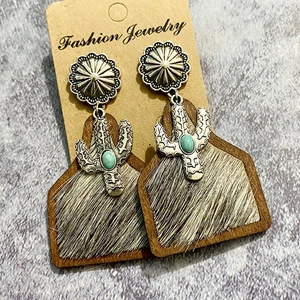 Western boho earrings with silver cactus, turquoise, wood, and horsehair details