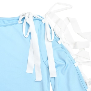 Close-up of light blue dress sleeve featuring white ribbon lace-up weaving details
