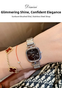 Detail of square silver quartz watch with sunray dial and diamond-set markers on wrist
