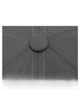 Detail of the gray quick-dry sports cap top featuring precise radial stitching and button