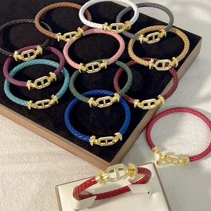 Bracciali in pelle intrecciata multicolore con fibbie a naso di maiale placcate oro 18k