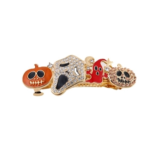 Halloween hair clip with orange enamel pumpkin, crystal ghost and elf in gold finish