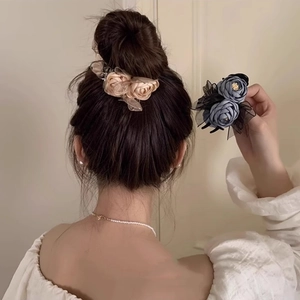 Elegant silk rose flower hair claw clips for buns in beige and blue floral colors