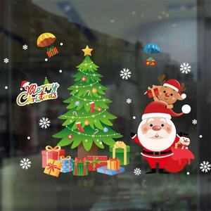 Detail showing Merry Christmas window decals with Santa Claus reindeer and snowflakes