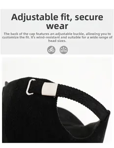 Detail of adjustable metal buckle and textured fabric strap on back of baseball cap