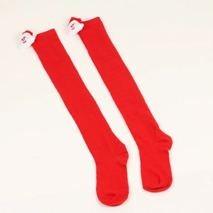 Detailed view of red knitted over-knee Christmas socks with 3D Santa Claus figure