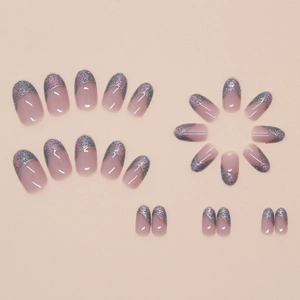 Glittery purple French tip press-on nails with gold wavy lines and nude base set